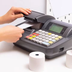 How to change a roll on a cash register?